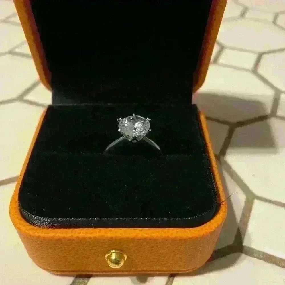 Eterna Moissanite Round Cut Solitaire Ring